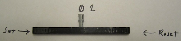 A mechanical SR flip-flop with output of 0.